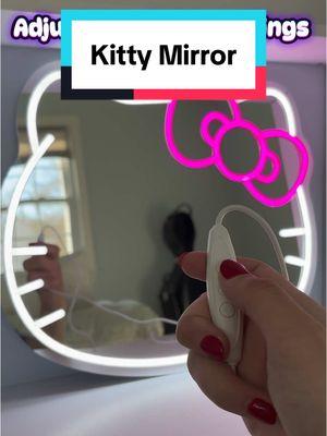 Glam your space with an adorable light-up kitty mirror!! #kittycat #catdecor #mirrors #makeupmirror #lightup #lightupmirror #decor #newyearnewaura 