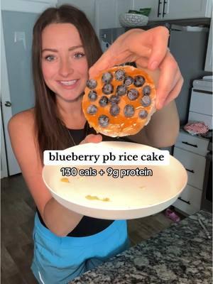 my new snack obsession 🫐🍯 ⬇️ saw this from @Jessica Barstow and couldn’t quit thinking about it!  1 lightly salted rice cake  2T @pbfit  1.5T water  blueberries 25 cals of honey (about 1 tsp) grab your rice cake - mix your pb powder with water and spread in your rice cake. top with blueberries and honey 🍯 #ricecakesnack #ricecakes #easysnack #proteinsnack #pbfit #caloriedeficitmeals 