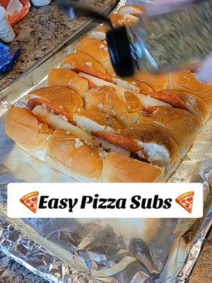 Since I triggered all the string cheese nazis from my last video, thought I'd reshare this super easy idea for pizza subs! Enjoy 🤌 #easydinners #mozerella #quickandeasyrecipes #easymeal #simplemeal #simpledinner #pizzasub #subsandwiches #pepperonipizza #hawaiianrolls 