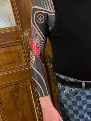 By Gerhard Wiesbeck #blackandred #tattoosleeve #armtattoo #tattooed #freshtattoo #armtattoos #geometrictattoo #blackwork #scene360 