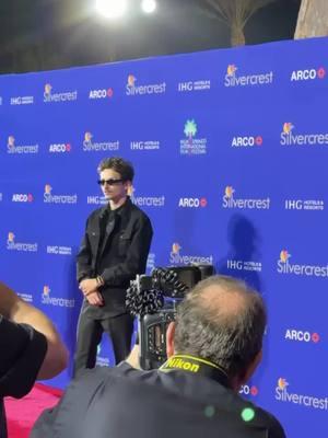 Timothée Chalamet poses for photos at #PSIFF 