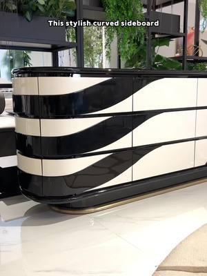 This stylish curved sideboard is a true work of art! Featuring a classic black-and-white color scheme, organized storage compartments, and smooth, elegant lines, it perfectly captures a sense of graceful beauty! #furniture #furniturefactory #italianfurniture #mansion #sideboard 