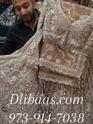 Light champagne color heavy embroidered party wear lehenga choli set, stuning outfit for reception function  #dlibaas #lehenga #lehengacholi #lehengaset #receptionlehenga #lehengaoutfit 