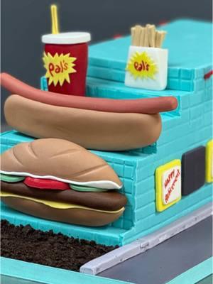 🎉 Celebrating a local icon with cake! 🎂🍔🌭 Watch as we bring Pal’s Sudden Service to life in cake form—complete with their famous burger, hot dog, fries, and drink. This sculpted cake was so much fun to create and is a tribute to a beloved local favorite. Whether you’re a fan of their cheddar rounds (my favorite) or their Big Pal burger, this cake is a sweet reminder of why Pal’s is such a treasure. Stay tuned for a behind-the-scenes look at how this came together! Let us know your favorite Pal’s order in the comments below! 🥤🍟 #PalsSuddenService #CakeArt #HyperRealisticCakes #LocalFavorites #Cakebuds #sculptedcake #cakebudsjc #cakebudsbakery