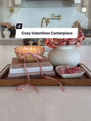 🎀Cozy valentines centerpiece🎀 this one turned out so cute and who doesn’t love flowers and chocolate?! Everything can be found in my LTK! #ValentinesDay #valentinescandy #valentinescenterpiece #centerpieceideas #amazonhome #homedecor #cozykitchen #valentinesinspo 