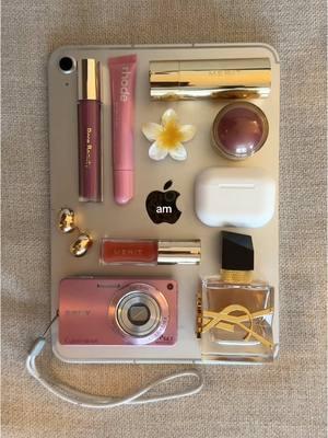 day to night essentials ⛅️🎀🩶🌙 #essentials #whatsinmybag #morningvibes #nightout #pinkgirl #itgirl #girlythings #aesthetic #pinterestinspired #makeuphaul #rhode #rarebeauty #yslbeauty #armanibeauty #meritbeauty #emijay #mejuri 