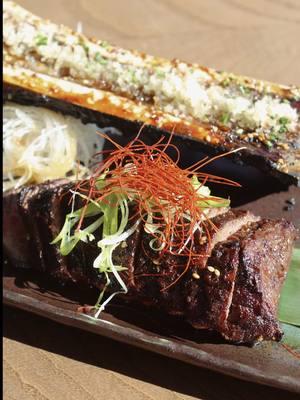 Steak Month spotlight: Snake River Farms Wagyu Sirloin + Grilled Bone Marrow, marinated with sweet garlic soy. 🥩 #steak #steaktiktok #robata #grilllovers #steakhouse 