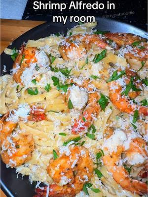 Making Shrimp Alfredo in my room! 🍤🍝 🧄 — This dish always smacks 😴 Ingredients 👇  * Fettuccine noodles * Shrimp * Salt & Pepper * Cajun seasoning  * Garlic & onion powder * Paprika * Olive oil * Butter * Heavy cream * Garlic * Chopped parsley * lemon * Fresh parmesan * Red pepper flakes (optional) #lazypotnoodle #lazypot #shrimpalfredo #alfredo #alfredosauce #pasta #shrimp #seafood #food #Foodie #foodies #foodtiktok #FoodTok #EasyRecipes #EasyRecipe #comfortfood #quickmeals 