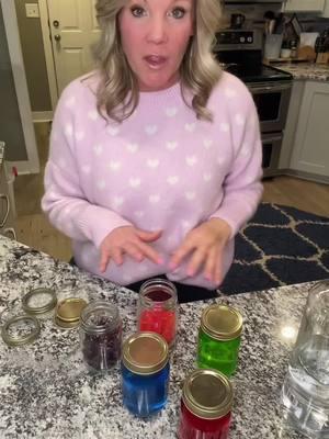 JOLLY RANCHER MARTINIS are BEAUTIFUL, INEXPENSIVE - and EASY!!! 🍸  #giddyupbitches #ValentinesDay #valentinesdaygift #jollyrancher #martini #DIY #cocktails #valentinesdaysweater #heartsweater #pinksweater 