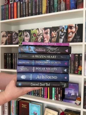 Disney Books all about Frozen. All of these are stand alone stories you can read in any order. I’d just make sure you’ve watched frozen 1&2 first.  Find these anywhere you normally get books or the 🔗 on my page. Books Featured: ❄️A Frozen Heart by Elizabeth Rudnick ❄️The Fixxer Upper by @jencalonitaofficial  ❄️Dangerous Secrets by @Mari Mancusi Books  ❄️Polar Nights Cast into Darkness by Jen Calonita and Mari Mancusi ❄️Forest of Shadows by Kamilla Benko ❄️All is Found by various authors ❄️Conceal Don’t Feel by Jen Calonita #disney #disneybooks #frozen #twistedtales @disneypublishing 