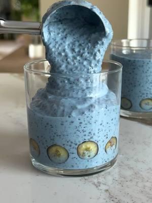 HIGH PROTEIN blueberry chia pudding that is sweet, tangy and so delicious! it’s loaded with healthy fats, fiber and of course naturally loaded with protein from the cottage cheese, collagen and the chia seeds. takes five minutes to prep, and you have a healthy grab and go breakfast or snack all week long that you’ll actually look forward to eating.  3/4 cup milk, or any other milk or nut milk alternative 1/2 cup cottage cheese, I like good culture 1/2 cup fresh or frozen blueberries 1 tsp blue spirulina 4 scoops of collagen 3 tbsp maple syrup, may sub honey, agave, date syrup or sugar 1/2 tsp vanilla extract 1/3 cup chia seeds Toppings: chopped pistachios, dark chocolate, shredded coconut, fresh blueberries #chiapudding #chiaseedpudding #healthymealprep #highprotein 