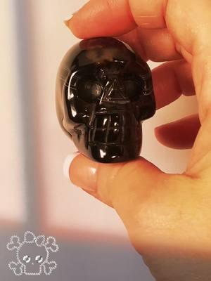 Onyx skull with banding! Black Onyx is widely known as a powerful protection stone. Its deep black color is associated with the night, symbolizing strength, perseverance, and the ability to overcome challenges. #crystal #crystals #black #skull #banding 