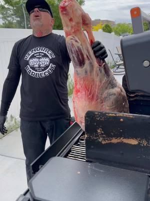 Fitting a 100 pound Cow Leg to my Traeger for a long cook.  Just getting from the car to the Traeger was a challenge 😂 #traegergrills #kendrickbbq #cowleg #smokedbeef #shreddedbeef #bbq #bbqbeef @Traeger Grills 