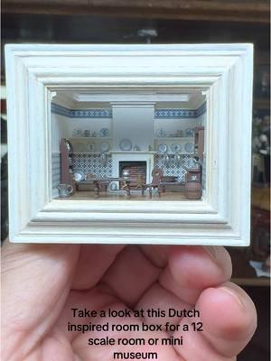 Dutch-inspired 1:12 scale dollhouse miniature artisan roombox (1:144 scale) crafted by the very talented IGMA Fellow @nell_corkin featuring period architectural details, porcelain and pewter-like accessories and note the chair with the heart shaped cut out and the wine barrel! #swoon #dollhouse #dollhouseminiatures #dutch #dutchinspired #miniaturist #miniac