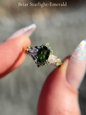 Lab emerald center with lab diamond sides and natural diamond accents, in my Briar Starlight setting, 14k yellow gold ✨ #uniqueengagementrings #emeraldengagementring #green 