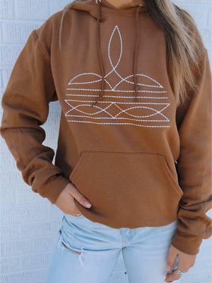 Our BESTSELLING hoodie of 2024🤠🤎 #westernstyle #westernfashion #cowgirls #boutique #westernboutique #westernwear #bootstitch 