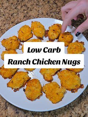 One of my favorite easy meals! 🤤 Low Carb Ranch Chicken Nugs! 12.5oz canned chicken, 1.5 cup shredded cheese, 1 LG egg, Ranch seasoning. Mix chicken, cheese, egg and Ranch. Shape into nug size. Cook at 400° for 20 mins. pair with dipping sauce of your choice! Macros for 1: Cal: 65, P: 7g, C: 1g, F: 4g. #simpledinner #simplemeal #easymeal #quickandeasyrecipes #easydinners #keto #lowcarbrecipes #ketorecipes #ketosnacks #ranchchicken #chickenbites #chickennuggets #healthysnacks #SuperBowl #superbowlsnacks 