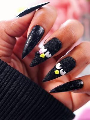 Badtz to Black 🖤 A little Fuzzy Badtz-Maru nail set 😎 This one is definitely a little different, but that’s what we’re here for! 😆 Would you wear a fuzzy flocked nail set? 💅 ___________________ Products Featured:  @Cris3dshop🧸 (Use c0de ✨NONNA✨ to save & support) 🧸 Classic Cris Clay in the shade Black 🧸 Silicone Tool & Sculpting Brush  @Ballpit Nail Art Products (Use c0de 🌟NONNA🌟 to save & support) 🔴 Fantasy Clay in the shades Unicorn White, Lemon Yellow, & Light Magenta  🟠 Gel Polish in the shade The Black 🟣 Glossy Top Coat & Matte Top Coat  🟢 Emo Black Liner Gel  🟡 Little Miss 9mm Nail Art Brush  🔵 Masterpiece Mat #nailinspo #3DNailArt #kawaiinails #badtzmaru #pressonnailset 