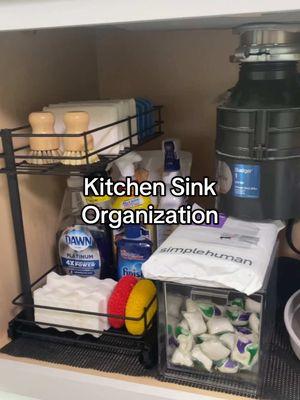 Organization ideas for under your kitchen sink! #kitchensink #kitchencabinetorganization #kitchensinkorganization #kitchenorganization #storageorganization #organizedhome #organizedkitchen 