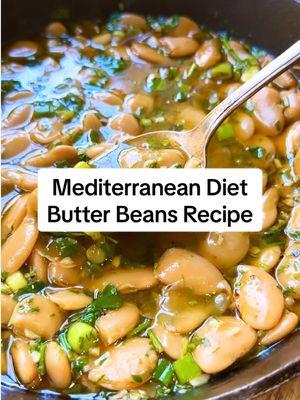 If you are wanting to follow the Mediterranean Diet, you need to eat more BEANS! Mediterranean Butter Beans with Garlic, Herbs and Lemon.  This vegan butter bean recipe is the next Mediterranean Diet recipe in my 30-Day Mediterranean Diet Meal Plan.  Butter beans simmer with lemony, spicy, herby and garlicky flavor until tender and delicious. This vegan dinner recipe is ready in just 15 minutes!  This is what eating the Mediterranean way is all about… easy, nutrition-packed meals. And so many plant based recipes that are tasty!  #mediterraneandiet #mediterraneanfood #mediterraneandietrecipes #mediterraneanmealplan #mediterraneandietmealplan #HealthyMealPlan #mealplanideas #butterbeans #butterbeansrecipe #beansb#beanrecipe #plantbasedrecipes #plantbasedprotein #veganrecipes #veganbeanrecipes  Ingredients: ▢ 2 tablespoons extra-virgin olive oil ▢ ½ teaspoon red pepper flakes ▢ ½ teaspoon Urfa pepper (optional) ▢ ½ teaspoon cumin ▢ ¼ teaspoon smoked paprika ▢ 4 garlic cloves, minced ▢ Kosher salt ▢ Black pepper ▢ 2 (15- ounce) cans butter beans, drained and rinsed ▢ 1 ½ cups vegetable broth ▢ Juice of 2 lemons ▢ 2 green onions, trimmed and chopped (both white and green parts) ▢ ⅓ cup roughly chopped parsley ▢ ⅓ cup roughly chopped dill