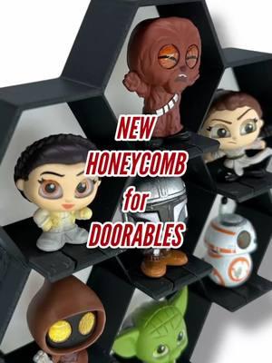 Trying to keep your Disney Doorables from falling over? We’ve got the solution! 🙌 Our honeycomb displays now have optional pegs to keep those tiny figures secure while still looking amazing. 🐝✨ Mount them on your wall or stand them up—your collection, your way. 💫 Expand, customize, and make your display as magical as your Doorables! 🔗 Link in bio #disneydoorables #funkopops #toycollectors #superherodiy #miniatures #organizationhacks #collectibles #displayideas #honeycomb 