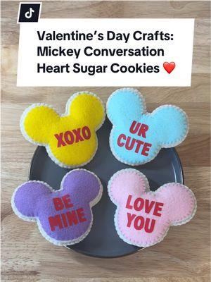 Valentine’s Day Crafts Part 1: Mickey Coversation Heart Sugar Cookies. 🩷🩵💜💛 Materials used: felt, embroidery thread and needle, poly fil, cricut heat transfer vinyl, and scissors #ValentinesDay #crafts #feltcrafts #feltfood #valentinesdaycraftideas #diyvalentine #valentinecrafts #DIY #valentinesdaygift 