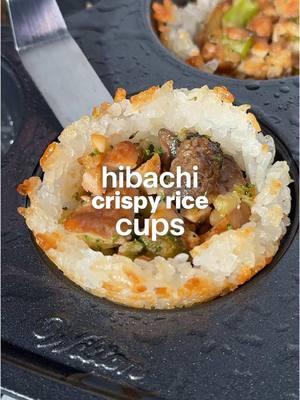 Hibachi Crispy Rice Cups Everyone loved the recipe for my Crab Rangoon Crispy Rice Sushi Cups, so I decided to recreate them using hibachi leftovers! These are perfect for dinner or for an app!  *I recommend using silicone muffin tin molds if you have them Ingredients • sushi rice *must use sushi rice for this recipe • leftover hibachi •yum yum sauce or sriracha mayo • sesame seeds •avocado oil spray Recipe *preheat oven to 400F 1. Spray a muffin tin generously with avocado oil or spray the insides of the silicone muffin cups & place in muffin tray compartments. 2. Scoop equal amounts of sushi rice in each & press gently to even out. Use a measuring cup to press & make cup shapes. Place in freezer for 1 hour. 3. Remove rice in muffin tray from freezer & spray rice with avocado oil. Bake for 20 min. 4. Chop up the leftover hibachi & scoop into each compartment & press down a bit. 5. Bake for about 10 min, until the rice is a bit golden on top. 6. Remove & let cool - this is important so the rice cups hold together. 7. Carefully use an icing/offset spatula to remove from muffin tin or carefully peel the molds. 8. Top with yum yum sauce & sesame seeds. enjoy!  #crispyrice #hibachi #leftovers #food #fyp #asmr #recipes #muffintin #appetizer #dinner #lunch 