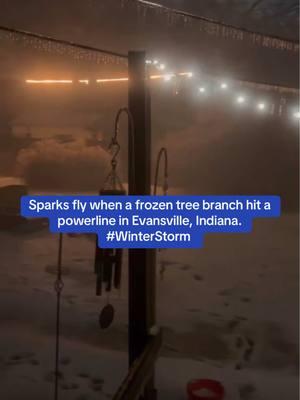 Sparks fly when a frozen tree branch hit a powerline in Evansville, Indiana. #WinterStorm #Evansville #Indiana  #Snow #Storm  #foryoupage 