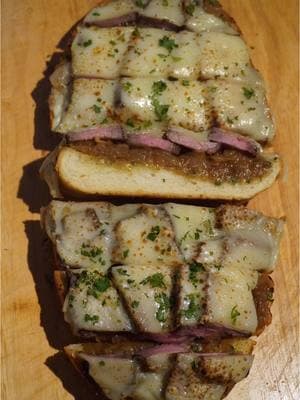 Cheesy Steak Garlic Bread 🥩 Super crispy garlic bread with caramelized onions, melty cheese, and juicy steak—made to perfection using the @From Our Place Titanium Always Pan Pro for the ultimate cook and sear. The perfect appetizer, elevated with this game-changing pan, now available on Costco.com! #ourplacepartner @Costco Wholesale   Link to pan: https://www.costco.com/our-place-4-piece-titanium-105-always-pan-pro-with-steamer.product.4000329693.html Why this pan?  The Titanium Always Pan Pro is built to last with a toxin-free, nonstick interior made from ultra-durable titanium. It comes with a steamer basket and a built-in spatula for all-in-one convenience. Save $65 by getting it on Costco’s website! 🛒 Trust me, this pan will transform your cooking game—grab it before it sells out!  Recipe Ingredients Garlic Bread: •	1 French bread loaf, halved •	8 tbsp butter, softened •	7 garlic cloves, minced •	2 tbsp parsley, finely chopped •	Mozzarella cheese slices •	Parsley, finely chopped (for garnish) Steak: •	16 oz ribeye •	Salt •	3 tbsp butter •	1 garlic clove, smashed •	1 sprig rosemary •	1 sprig thyme •	Shallots, sliced (optional) Caramelized Onions: •	5 onions, thinly sliced •	1 tbsp balsamic glaze Instructions •	Prep steak: Season ribeye with salt overnight in the fridge for a perfect crust. •	Garlic butter: Mix softened butter, minced garlic, and parsley. •	Caramelized onions: Cook onions on medium heat until soft, lower heat to caramelize (45 min), then add balsamic glaze. •	Cook steak: Sear ribeye on medium-low, flipping often. Add butter, garlic, and herbs at 100°F. Baste until 120°F, rest, then slice thinly. •	Garlic bread: Spread garlic butter on halved French bread. Toast at 350°F for 8 minutes. •	Assemble: Top bread with caramelized onions, steak, and mozzarella. Bake 4–5 minutes, then broil or torch for a golden cheesy crust. #steak #garlicbread #caramelizedonions #cheesygarlicbread #EasyRecipes #recipes #ad #fromourplace 