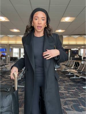 best travel hack in the winter is to pack outfits around one coat and wear the coat over your travel outfit #airportoutfit 