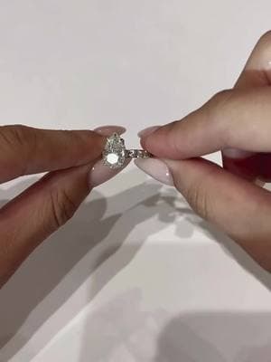 A setting that compliments just about every stone! Our Bella pavé setting has a super comfortable 2.5mm scalloped edge band that feels feminine and so glam with a stone-forward look✨ This client opted for a 4 carat (1.56 ratio) pear center for theirs— $3,500 (as shown) #eastwestgemco #moissaniteengagementring #customengagmentring #eastwestbella #pearcut 