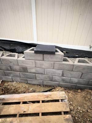 What are you guys think about how this wall looks? #constructionwork #trusttheprocess #wall #pavers #install #retainingwall 