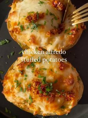 Chicken Alfredo Stuffed Potatoes  by @thedailykale ✨ Simple yet delicious, this is the perfect easy weeknight dinner to whip up in no time! 1 potato 1/2 cup chopped / cooked chicken 1/2 cup shredded mozzarella Garlic powder, paprika, oregano, black pepper, and salt (to taste) 2-3 tbsp Alfredo sauce 1. Bake potato with oil and a little sprinkle of salt for 1 hour, at 400F. 2. Once potatoes have cooled a little bit, enough to handle them without burning yourself, cut them in half.  3. Scoop potato filling out of potato, *carefully* and place in a bowl with chicken, spices, cheese and Alfredo sauce. Mix together. Place the mixture evenly into the potatoes. 4. Place back in oven at 425F, top with extra mozzarella, and abke for 12-15 minutes or until cheese has melted. Can broil for the last couple of minutes if preferred. I topped it with fresh parsley and chili onion crunch from Trader Joe's.  *This serves 1 or 2 potato halves #feedfeed#dinneridea #chickendinner #easydinner #EasyRecipe #dinnerdieas #chickenalfredo #loadedbakedpotato #bakedpotato #stuffedpotato