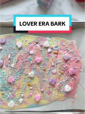 This Lover Era inspired colored white chocolate bark is a cute lil v day treat for the Swiftie in your life!  It’s super easy to make & covered in sprinkles, conversation hearts, and edible glitter. The best part? You can melt one big bowl of white chocolate in the microwave (carefully!) & divide once melted to color.  You’ll want to make sure you use an oil based colorant or your chocolate will be ruined! I’ll tell you my fav in the comments. 🩵🩷 #taylorswift #loverera #valentines #valentinestreats #dessert 