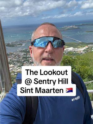 🚠 The Lookout at Sentry Hill: A Must-See in Sint Maarten! 🌴✨ If you’re visiting Sint Maarten, make sure to check out the stunning views from the Lookout at Sentry Hill! Perched high above the island, this spot offers a breathtaking panorama of both the Dutch and French sides, with crystal-clear waters and even glimpses of neighboring islands like Saba and Anguilla on a clear day. Whether you’re a nature lover, photographer, or just someone who loves unforgettable moments, this is the perfect place to soak in the beauty of the Caribbean. Add it to your bucket list… you won’t regret it! #saintmaarten #travelgoals #caribbean #bucketlistadventures #sintmaarten #cruiseexcursion #celebritycruises #bradandchisadventures #celebritybeyond #excursions #bestview #mahobeach   