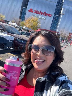 First trip of the year! We outside!  In a sea of red… be supportive! ❤️💛#gopackgo #myheartisgreenandyellow #ninergang #bassproshop #pink #rednails #statefarmstadium 