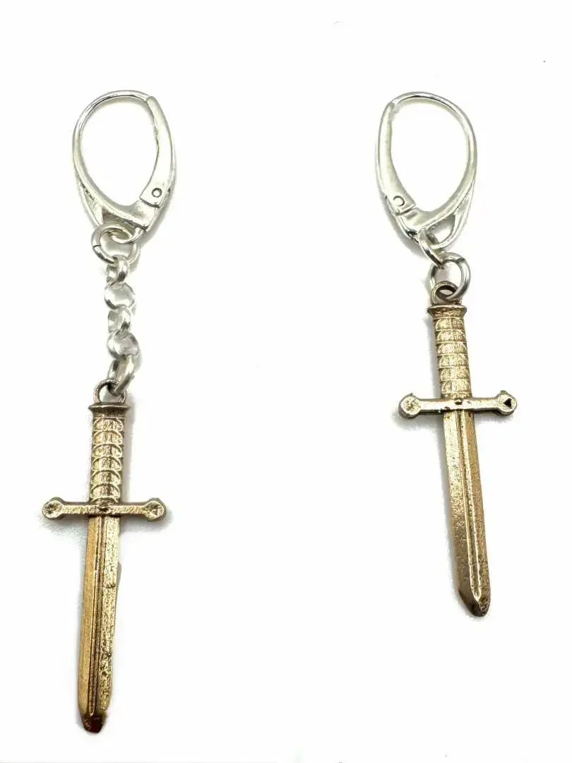 Dark Deals have surfaced from the shadows—are you brave enough to claim them? 🖤💀 Dangling Dagger Earrings # #Accessories #Jewelry #Edgy #Exclusive #GothicLuxury #Creations #Gothicjewelry #Bold #Rebel Buy here https://julianthe2nd.com/products/brutalist-stud-earrings-citrine-cabs-in-sterling-silver