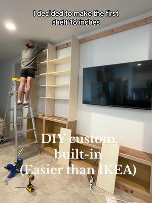 I’m building a custom built-in entertainment center the entire length of our living room - this thing is 15’ long & im convinced if you can put together an IKEA Billy Bookcase you could build this too.  Today I got all of my cabinets secured, all of my shelves up onto the wall and started working on the header portion. It’s all coming together!! Can you see the vision? #custumbuiltin #DIY #livingroommakeover #doityourself #diymama #todayimmaking #ikeahack #unfinishedcabinets #customentertainmentcenter 