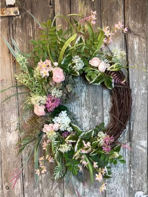 Check out one of the hottest spring wreaths in the shop! #fyp #springdecor #springwreath #doordecor #floraldesign 