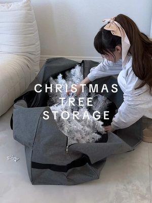 exact storage bag above 👆✨   #resetafterchristmas #declutterandorganize #declutter #christmastakedown #christmasdecor #christmasstorage #christmastreestorage #treestoragebag #takingdownchristmasdecorations #takingdownchristmas #afterchristmas #organizingandcleaning #organizedhome #organizingtiktok #vanillagirlaesthetic #tiktokshopchristmas #tiktokshopstorage #creatorsearchinsights    I’m definitely in my feelings about taking down my Vanillamas tree, but this Christmas tree storage bag is making the whole post-Christmas cleanup a little easier. It’s massive—big enough to fit a tree up to 9 feet tall! My white Christmas tree is 6 feet, and as you can see, there’s still plenty of space left for garlands, wreaths, and other decor. I went with the gray color, and the inside lining feels super durable. The bag measures around 60” x 20” x 30” and I love that it has sturdy straps for easy carrying. Total game-changer for staying organized!