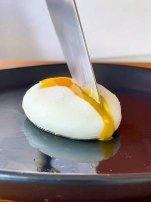 How to perfectly poach an egg. Top Post 2024 ✨How to perfectly poach an egg (Late to post) Start by adding 1 tbsp vinegar or lemon juice to 4 cups water (optional but egg whites coagulate better in acid conditions). Using a sieve to strain the outer albumen. Carefully transfer egg to a ladle (it’s best to use silicone, if using stainless steel or ceramic lightly grease the ladle or the egg will stick) drop egg into pot of 200 F water, keeping egg in ladle for 4-6 seconds before tilting letting the egg slip off. Turn the heat down. Cook 2-3 min for soft yolk and 3-4 min for cooked yolk. If sensitive to vinegar flavor, rinse poached egg and pat dry before serving.  . . . . . #eggs #poachedegg #cooking #brunch #Foodie #learntocook #foodscience #nyfoodie #foodtiktok #todayilearned 