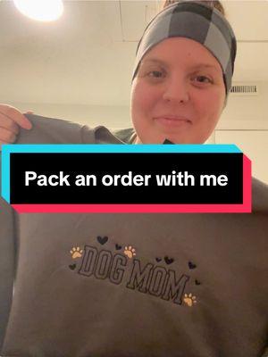 Come pack an order with me! This is our adorable Dog Mom crewneck in the color Charcoal with the black and brown stitching choice! #dogmom #dogmomlife #dogmama #packanorderwithme #customshirt #crewneck #dogmomshirt #puppymom #customsweatshirt #embroideredsweatshirt #embroidery #abroseandco 