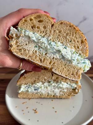 It's #trendingtuesday and @Alexa Santos is making Dill Pickle Cream Cheese 🥯🥒 inspired by @GrilledCheeseSocial  Get the recipe below and keep tagging #feedfeed for a chance to be featured. INGREDIENTS: 1 cup cream cheese 2 Kosher dill spears 5 dill pickle chips Small bunch fresh dill 3 scallions 1 teaspoon garlic powder 1 teaspoon Kosher salt RECIPE: 1. Add all ingredients to a cutting board. Use a sharp knife to chop all ingredients and mix together. #EasyRecipe #pickles #bagels 