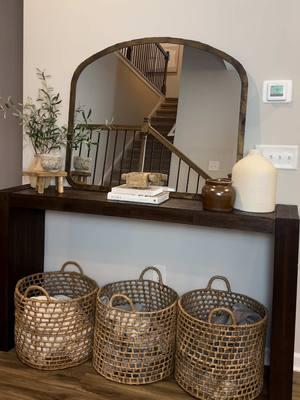 When I style an entryway table, groupings are the easiest way to fill the space. I typically like to do this in threes. A template for styling an entryway table is simple: 1) Use groupings, 2) Incorporate greenery of some sort, 3) Create different heights with objects like pedestals or books, and 4) Include a vase! This is GUARANTEED to give you the vibes you’re looking for EVERY time when you use this template. #entrywaydecor #homedecorideas #homedecortips #entrywaystyling 