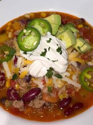 Taco Soup!  The flavors in this soup is perfect. Plus it’s hearty and comforting. I used ground turkey and turkey sausage, my signature seasonings, tri-color bell peppers and 3 different beans. Add some fresh jalapeños for that extra heat and crunch. #recipes #tacosoup #viraltiktok #comfortfood #reels #clubbkitchenbykiaj 