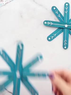 These popsicle stick snowflakes are the perfect winter craft! ❄️ Super easy and fun for kids of all ages! Just grab some colored craft sticks, metallic markers, and rhinestones to make these festive beauties! ✨ #wintercrafts #popsiclestickcrafts #snowflakes #kidcrafts #winterfun #craftforkids #holidaycrafts #diycrafts #winteractivities #snowflakeart #crafttime #handmadecrafts #holidayfun #crafting #familyfun #crafty #wintervibes #kidsactivities #festivefun #craftyideas #rainbowcrafts #holidaydecor #kidsdiy #winterwonderland #craftingtime #handmadeholiday #diyprojects #funwithkids #craftsforall #metallicmarkers #rhinestonecrafts #winterseason