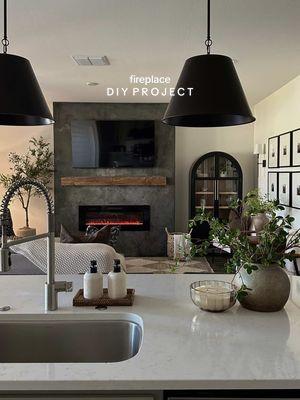 Our most viral home project of 2024 🖤 Get yourself a husband that can make your DIY dreams come true 🫶🏼  #homeproject #diyproject #neutrallivingroom #neutralhome #homeprojects #homedesign #homeinspo ##livingroomdecor #hometransformation #diyfireplace #fireplace #DIY #homediy #homebeforeandafter 