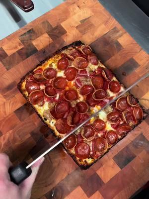 Pan Fried Pizza 🤤  We are serving up Detroit Style Pizza in a food truck just north of Houston.  Detroit Style pizza has been around since the 1940s. It’s is pan pizza with a ton of olive oil that goes into the pan which fries the bottom of the dough. We make our dough and treat it like focaccia bread so it is super light and airy. Cheese gets topped all the way to the edge of the pan which turns the crust Into a crunchy crispy baked cheese edge.  Why does pepperoni curl and crisp? This style of pepperoni dates back to Buffalo NY, also in the 1940. The sausage is packed in a natural collagen casing. So it curls (like bacon), when cooked. Put some extra cigar in the recipe to char and crisp. If your pepperoni does not curl, it is packed in an artificial casing which is not natural.  🚨 If you plan to visit us later in night Friday or Saturdays, 100% schedule a pre order. Our dough is hand made and we only have room for so much so sell outs will happen on Friday and Saturday nights. We are a small food truck with very limited space. Seeing people drive 1-2 hours to a sold out sign hurts my soul so please Please visit toastedpizzaco.com  📍 @crazytrainbar  🛻 Food Truck  📬 Sign up for email marketing to receive deals on certain holidays or events. Visit our website to do so.  ⏰ Wednesday 4-8 (or sell out) ⏰ Thursday 4-8pm (or sell out)  ⏰ Friday 4-9pm (or sell out) ⏰ Saturday 12-8pm (or sell out)  #Foodie #htxfood #houstonfoodie #tiktokfood #tiktok #houstoneats #foodiesoftiktok #thewoodlandstx #foodietiktok #pizzapizza #magnoliatx #htxfoodie #asmrtiktoks #asmr #asmrfood #asmrvideo 