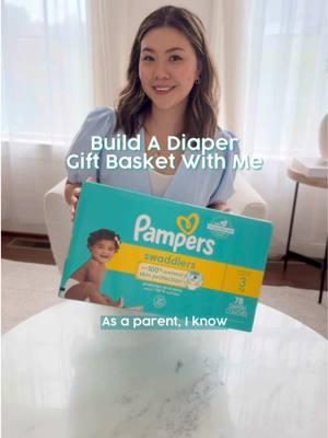 What’s the secret to the perfect diaper gift basket? Pampers Swaddlers, of course! @Liz Pak shows you a fun way to gift essentials for the baby in your life 💛  #PampersPartner #DiaperGiftBasket #PampersSwaddlers #Diapers #fyp #VideoDescription  Liz demonstrates how to pack a thoughtful diaper gift basket for her friend who just had her first baby. She highlights packing essential products like Pampers Swaddlers, explaining why they are a must-have for newborns.