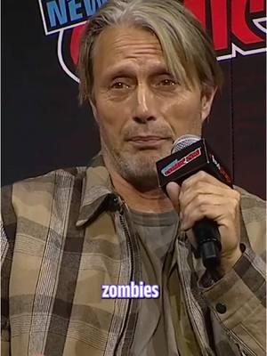 Mads Mikkelsen loves ZOMBIES & THE WALKING DEAD What dark entertainment and scary stories could possibly entertain, murder boys Mads Mikkelsen and Hugh Dancy of Hannibal fame? Live on stage at @New York Comic Con 2024 they drilled down on this very answer. Turns out Mads is a die-hard fan of The Walking Dead! With all the spinoffs coming out of Robert Kirkman's Universe is it time we demand the Hannibal x TWD crossover we've didn't know we need? Watch Mikkelsen fanboy over all things zombies in this clip! Watch the panel highlights ► https://youtu.be/o54H6XNuM_4 Watch the full panel on Popverse ►  https://www.thepopverse.com/  #hannibal #madsmikkelsen #hughdancy #nycc #popverse #thepopverse #popversesays #reedpop 